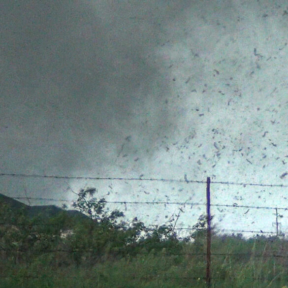 Debris in the air as the tornado approaches Sooner Rd. Video Still