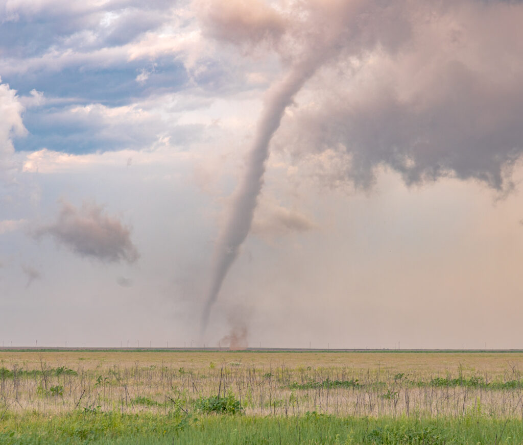 Clearly two tornadoes in this picture with the main one roping out and the secondary one in the foreground uncondensed